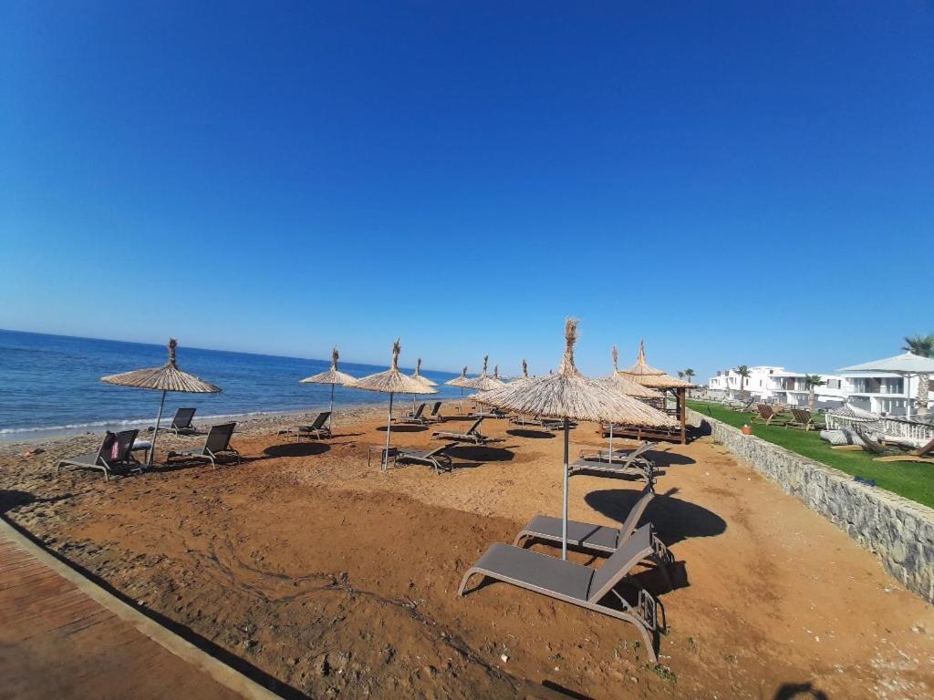 Дизайнерская студия на первой береговой линии Four Seasons Iskele Iskele District  Экстерьер фото